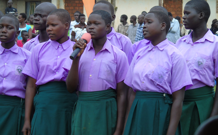 Girls sing during the African Child Day commemoration in Gulu on Tuesday at Bobi Sub County. Photo by James Owich
