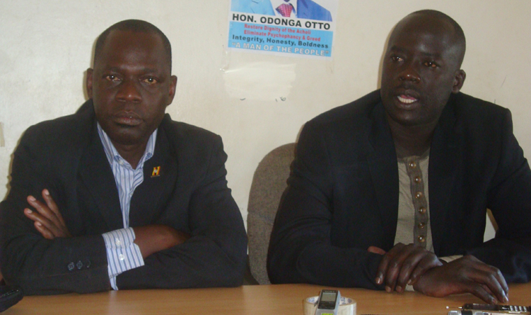 Aruu County MP Odonga- Otto (left) and his counterpart for Kilak County in Amuru district, Gilbert Olanya launching failed bid to oust Jacob Oulanyah, the Deputy Speaker of Parliament in Gulu in August 2013. Photo by James Owich