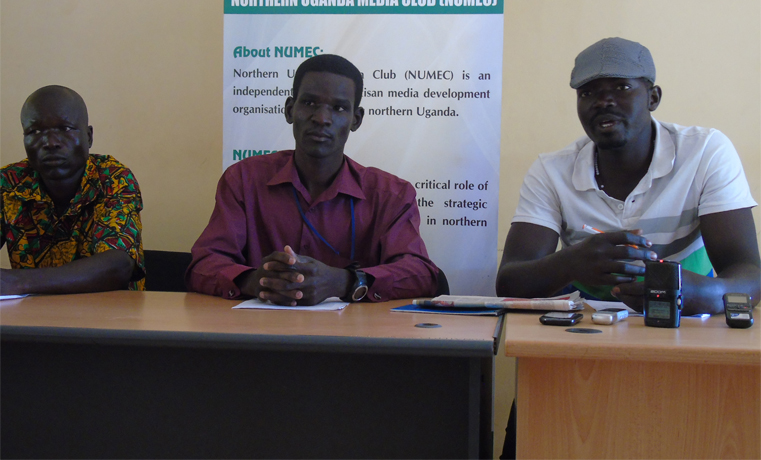 Douglas Olum, the Chairperson of Association of EX- LRA Abductees & Survivors (C) flanked by members Simon Lubangakene (Left) and Michael Toolit (Right) during a press briefing at Northern Uganda Media Club (NUMEC) facilities on Thursday in Gulu town
