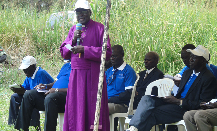 The retired Anglican Bishop for Northern Uganda Diocese Nelson Onono Onweng addresses 2004 LRA survivors during International Criminal Justice day at Lukodi on Friday last week