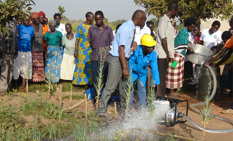 Local farmers’ group in Loyoboo village, Unyama Sub County, Gulu district gain experience on how to use mini water irrigation system on Wednesday