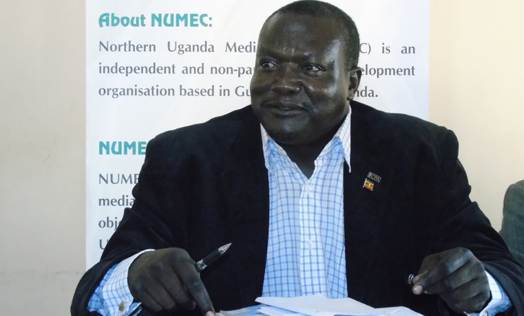 Simon Toolit Akecha, the District FDC party Chairperson addresses press over Demonstration involving NRM youth at Northern Uganda Media Club (NUMEC) offices on Tuesday. By James Owich