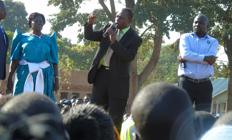 Gilbert Olanya, the Member of Parliament for Kilak County in Amuru district addressing residents of Gulu town on Friday at Kaunda Grounds