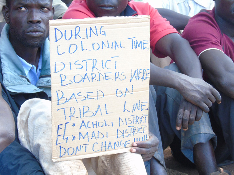 Apaa residents carry placard