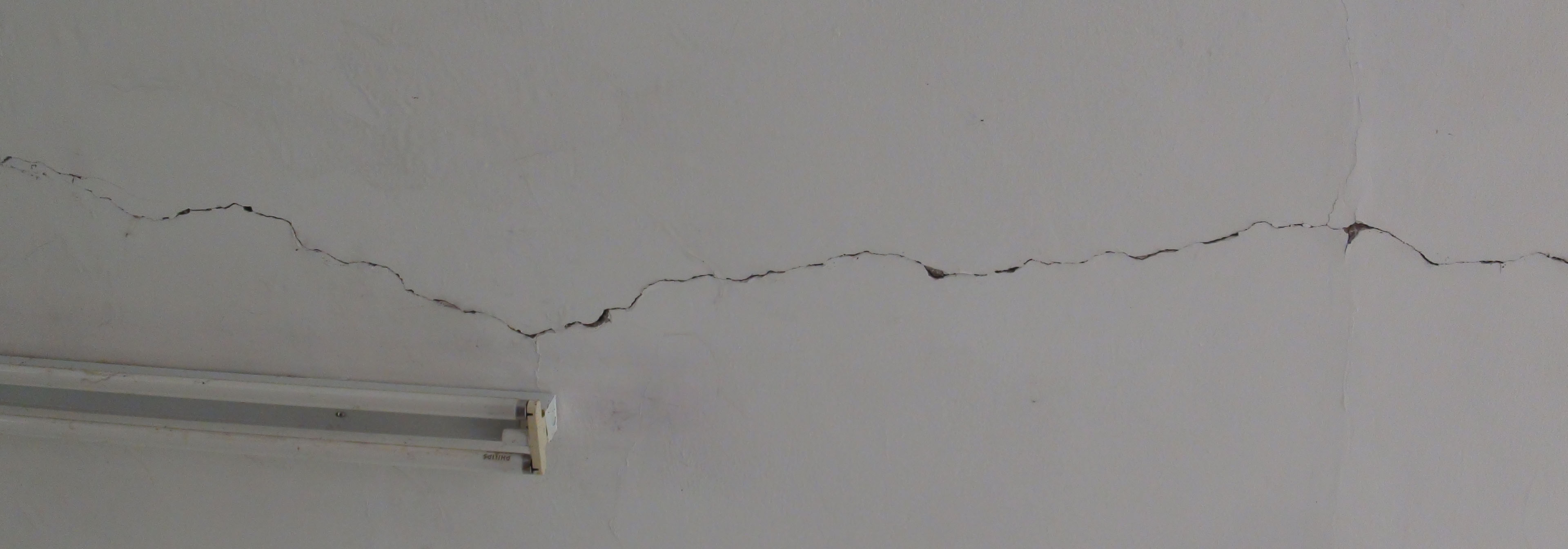 Cracks visible on the wall-ceilings of Kitgum Chief Magistrate Court room.