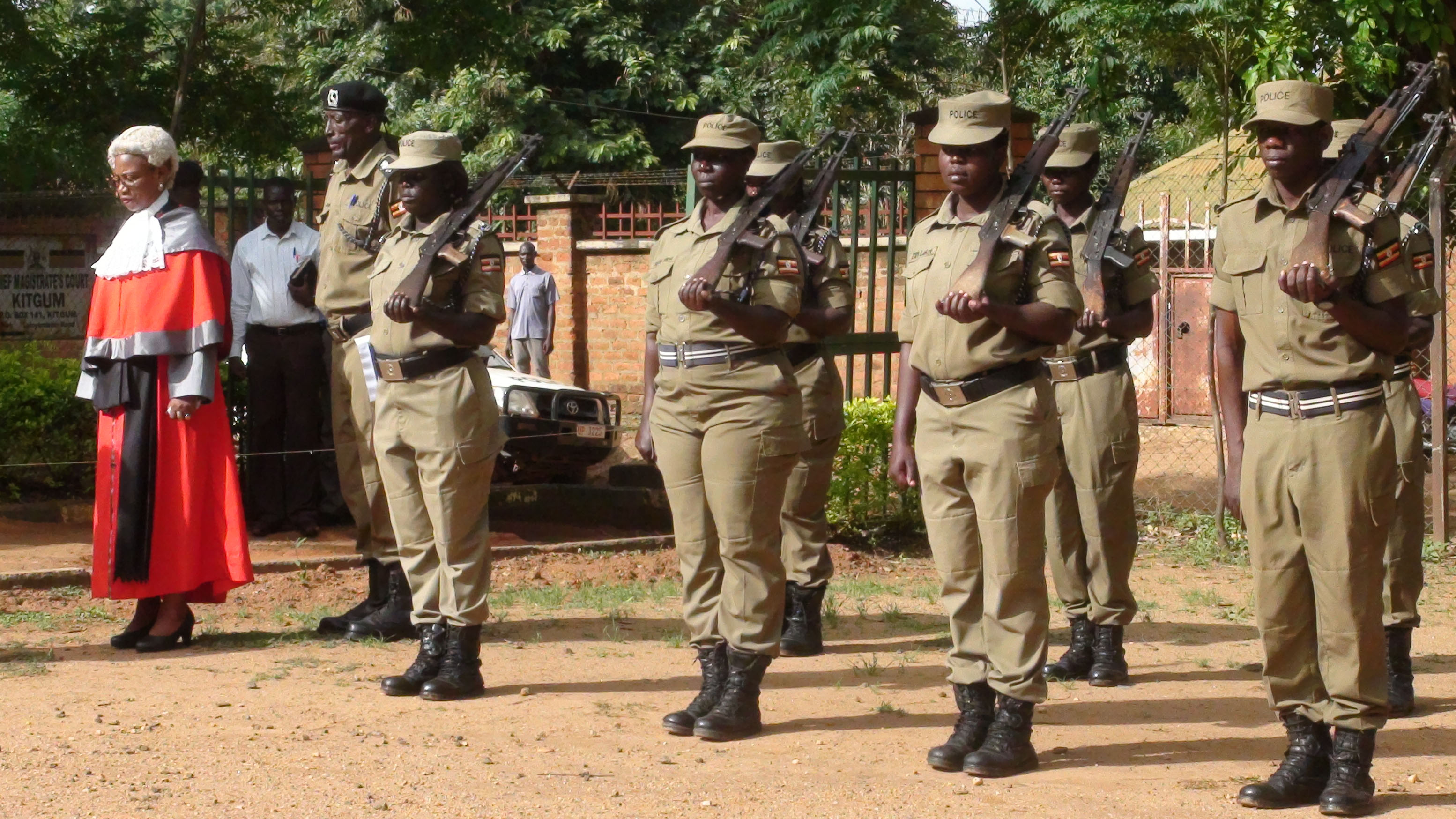 Lady Justice Margaret Mutonyi inspects a guard of honour mounted by officers of the Uganda Police Force at the launch of High Court Criminal Session at Kitgum Chief Magistrate Court on Monday.
