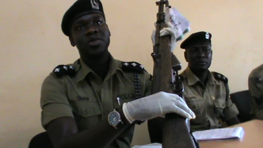 PatrickJimmy Okema Police spokesperson displays one of the guns