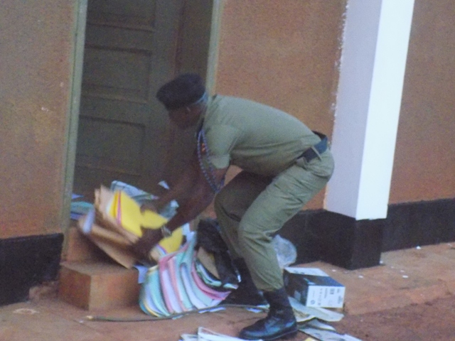 Gulu DPCMartin Okoyo carrying some files from one of the offices (1)