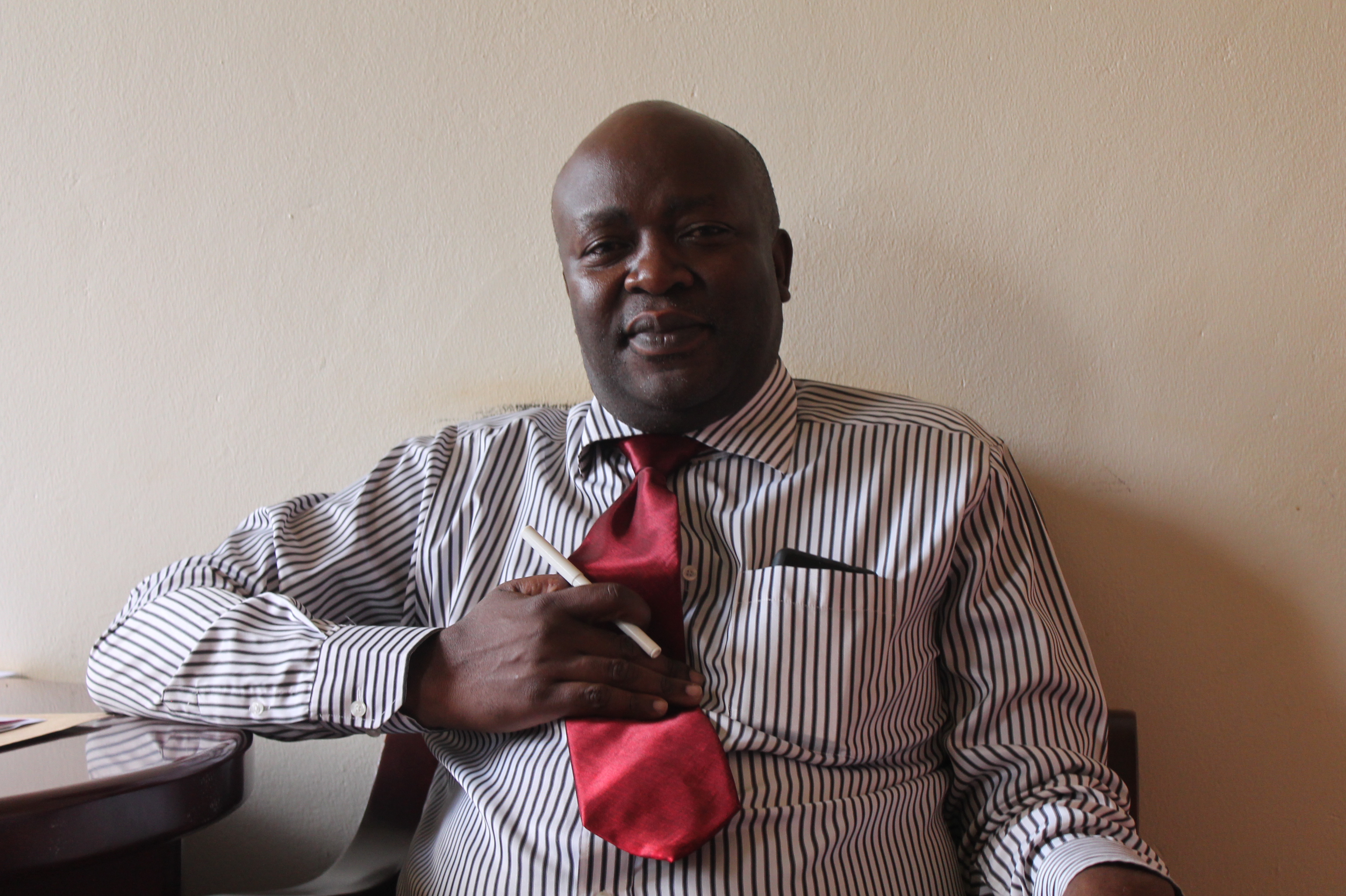 Nathan Onyachi during an interview from his office